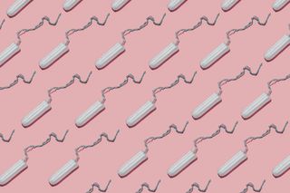 Periods and vaccine: A product shot of tampons on a pink background