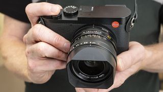 Leica Q3 camera in the hand