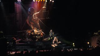 Photo of James HETFIELD and METALLICA and Jason NEWSTEAD and Lars ULRICH and Kirk HAMMETT; L-R: Jason Newstead, Lars Ulrich, Kirk Hammett, James Hetfield performing live onstage.