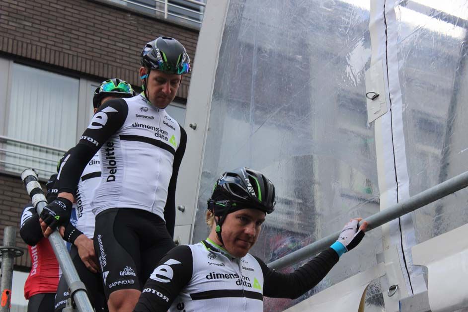 Tyler Farrar and Matt Brammeier make their way down the steep steps from sign on