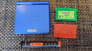 Game Boy Advance with LeafGreen and FireRed cartridges