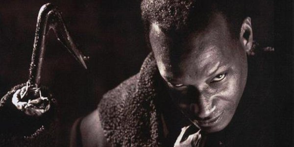 Candyman Tony Todd looking at the camera with a menacing smile