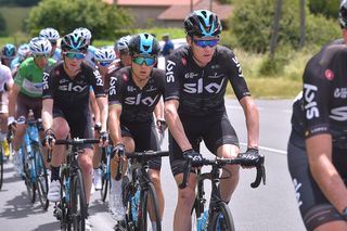 Chris Froome sits in the bunch with teammate Michal Kwiatkowski