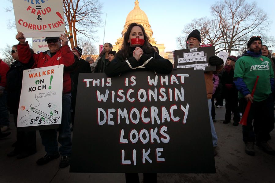 Federal judge strikes down Wisconsin voter ID law