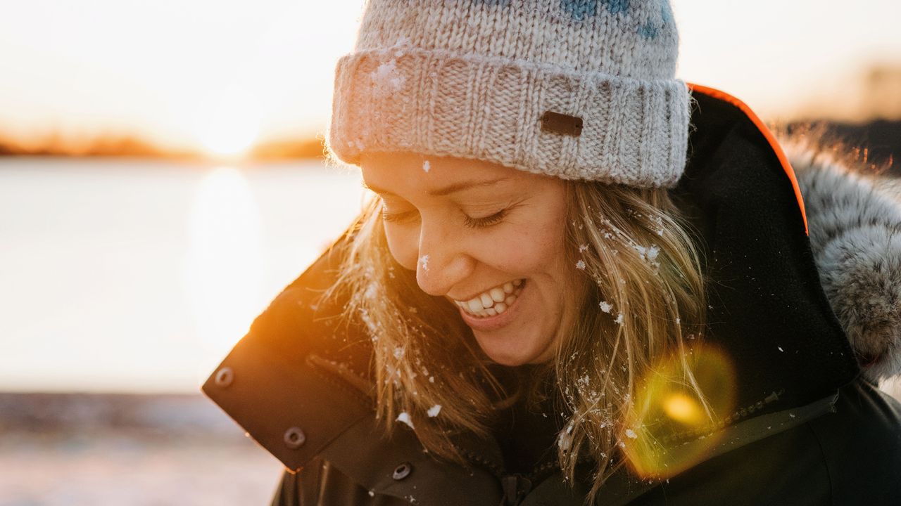 Woman getting vitamin D from the winter sun