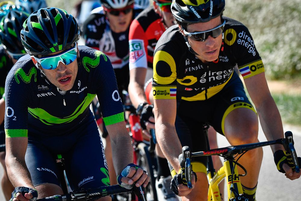 Jesus Herrada Lopez (L) and France's Sylvain Chavanel lead a breakaway during the 193.5 km sixth stage of the 75th edition of the Paris-Nice