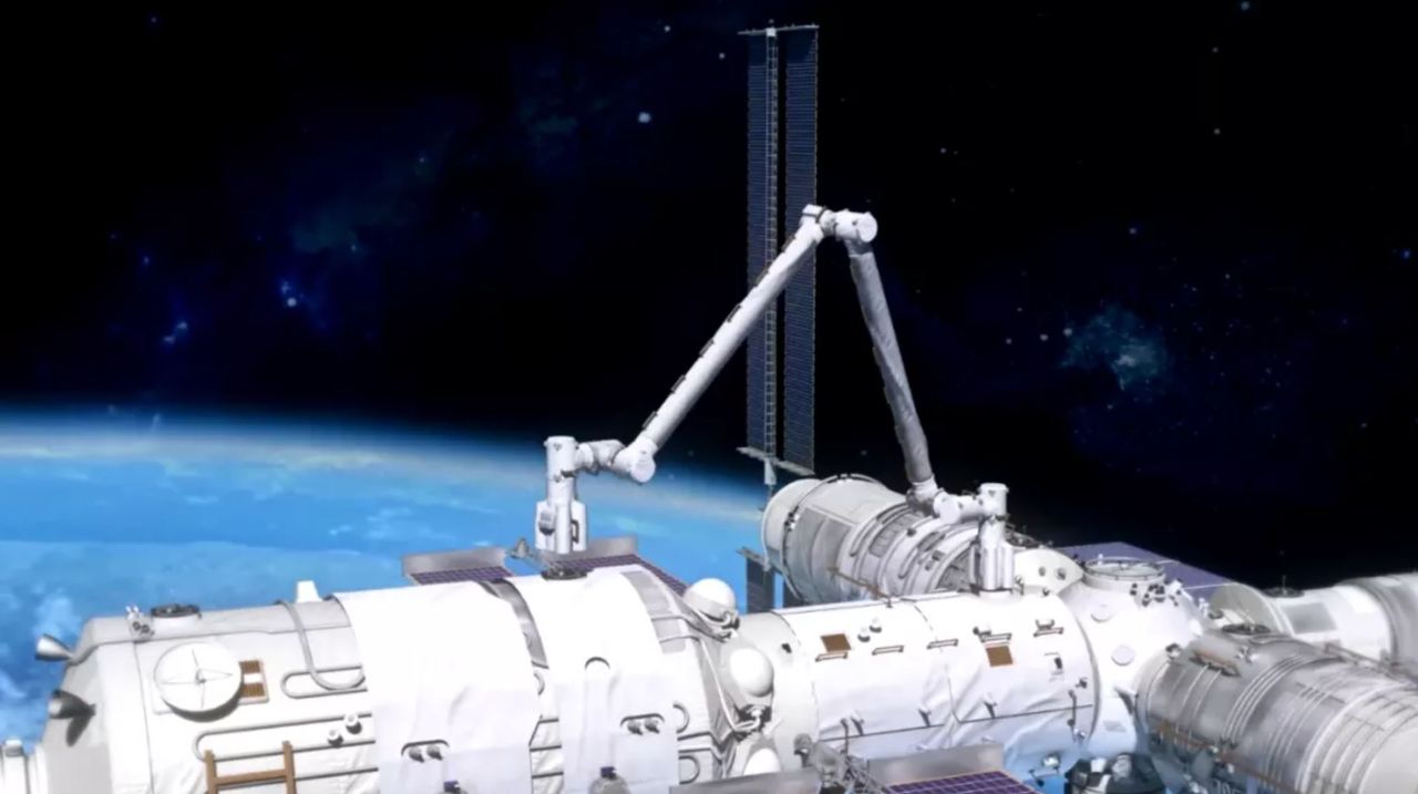 An artist's rendering of China's space station and its 33-feet (10 metres) long robotic arm.