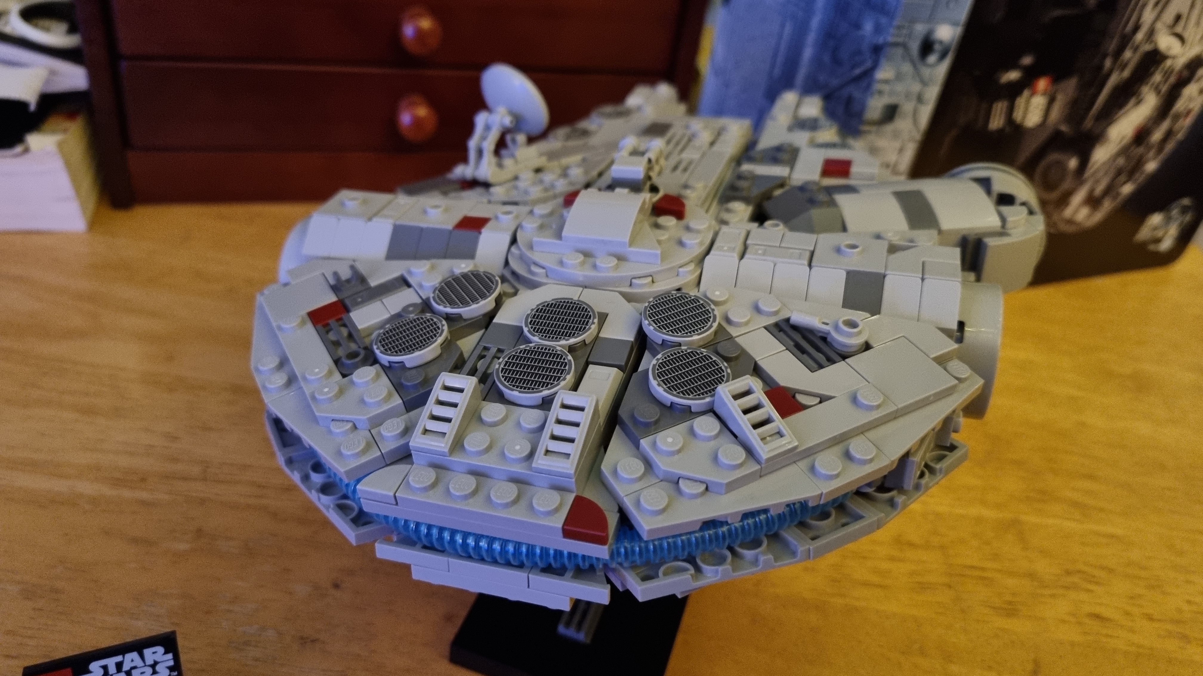 The Lego Millennium Falcon 25th Anniversary Edition in various poses