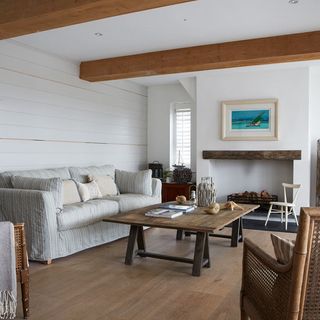 Coastal living room with white wood panelling
