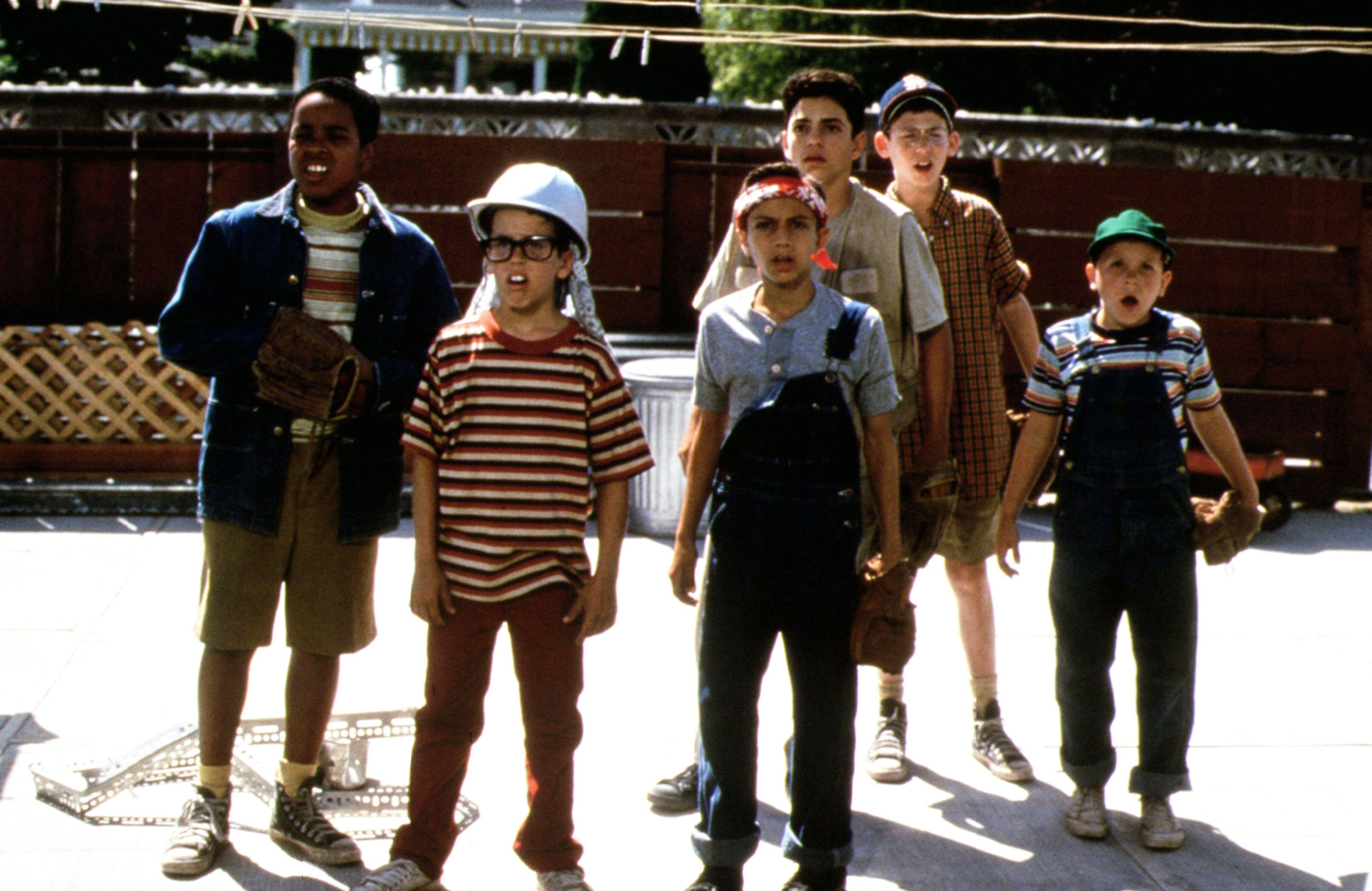A still from 'The Sandlot' of young boys at a makeshift baseball dugout