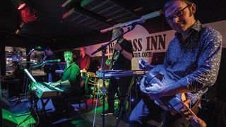 William D Drake and band on stage