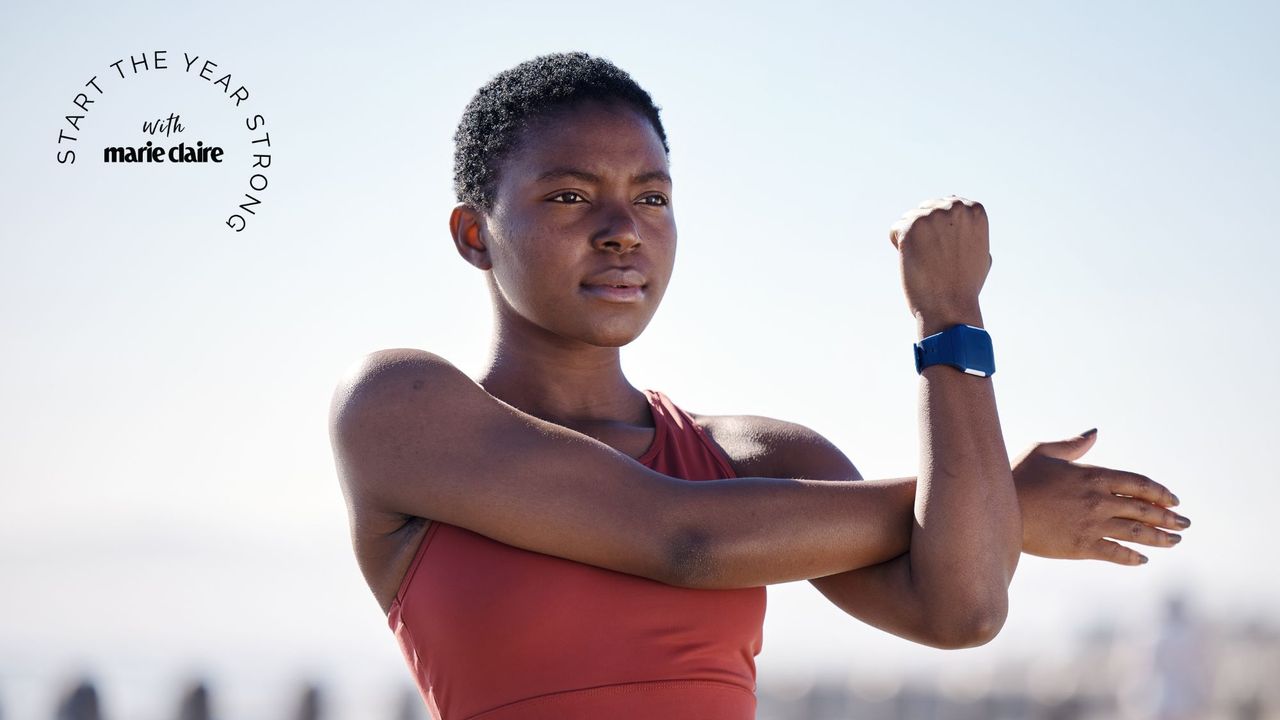 Upper body bodyweight exercises: A woman stretching her arms after working out 