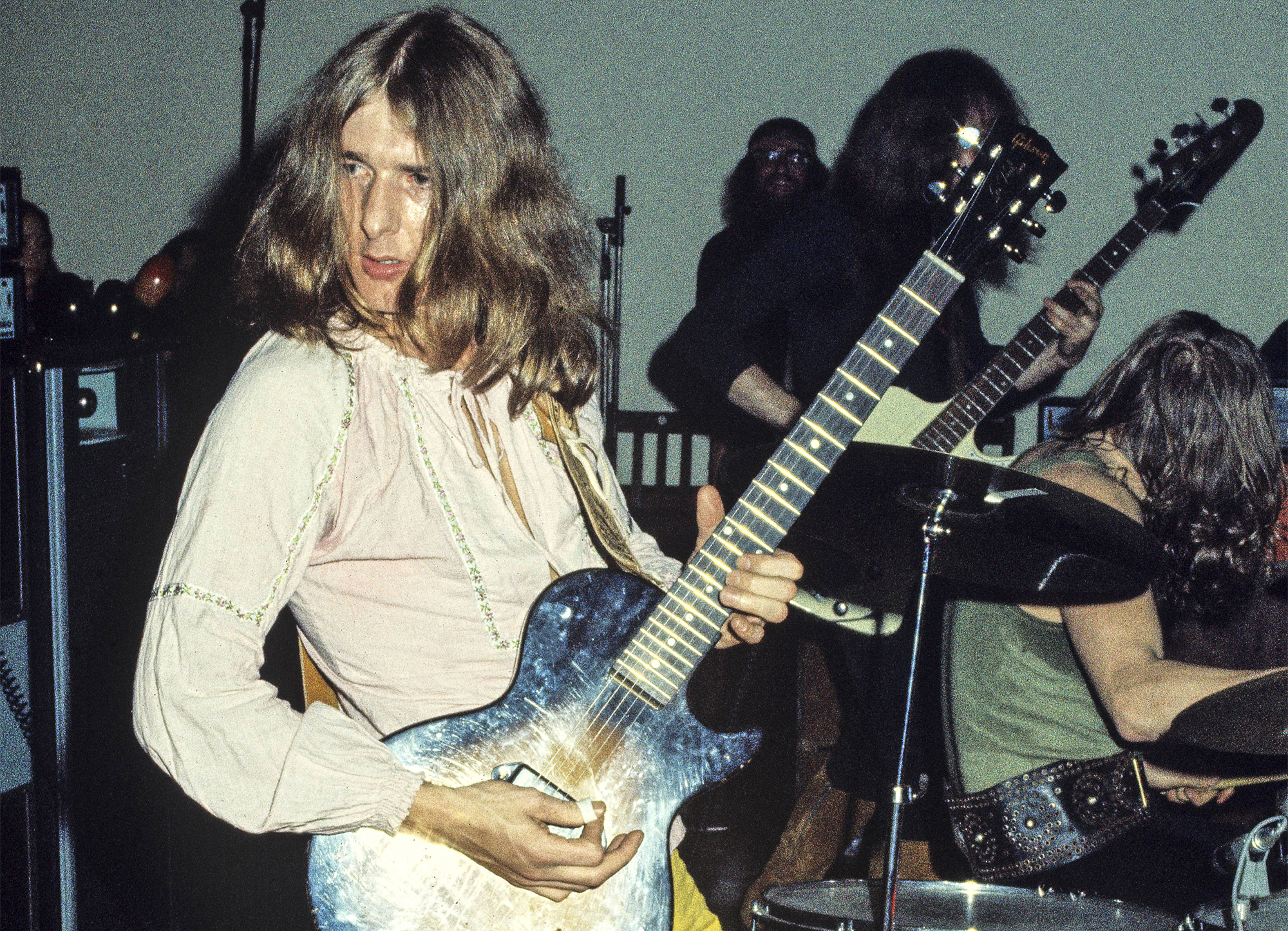 Mick Ralphs of Mott The Hoople performs on stage at Birmingham Town Hall on December 26 1970. He plays a Gibson Les Paul Junior guitar.
