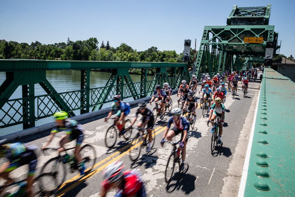 The riders cross a bridge during stage 1 of the 2018 Amgen Women's Race around Elk Grove
