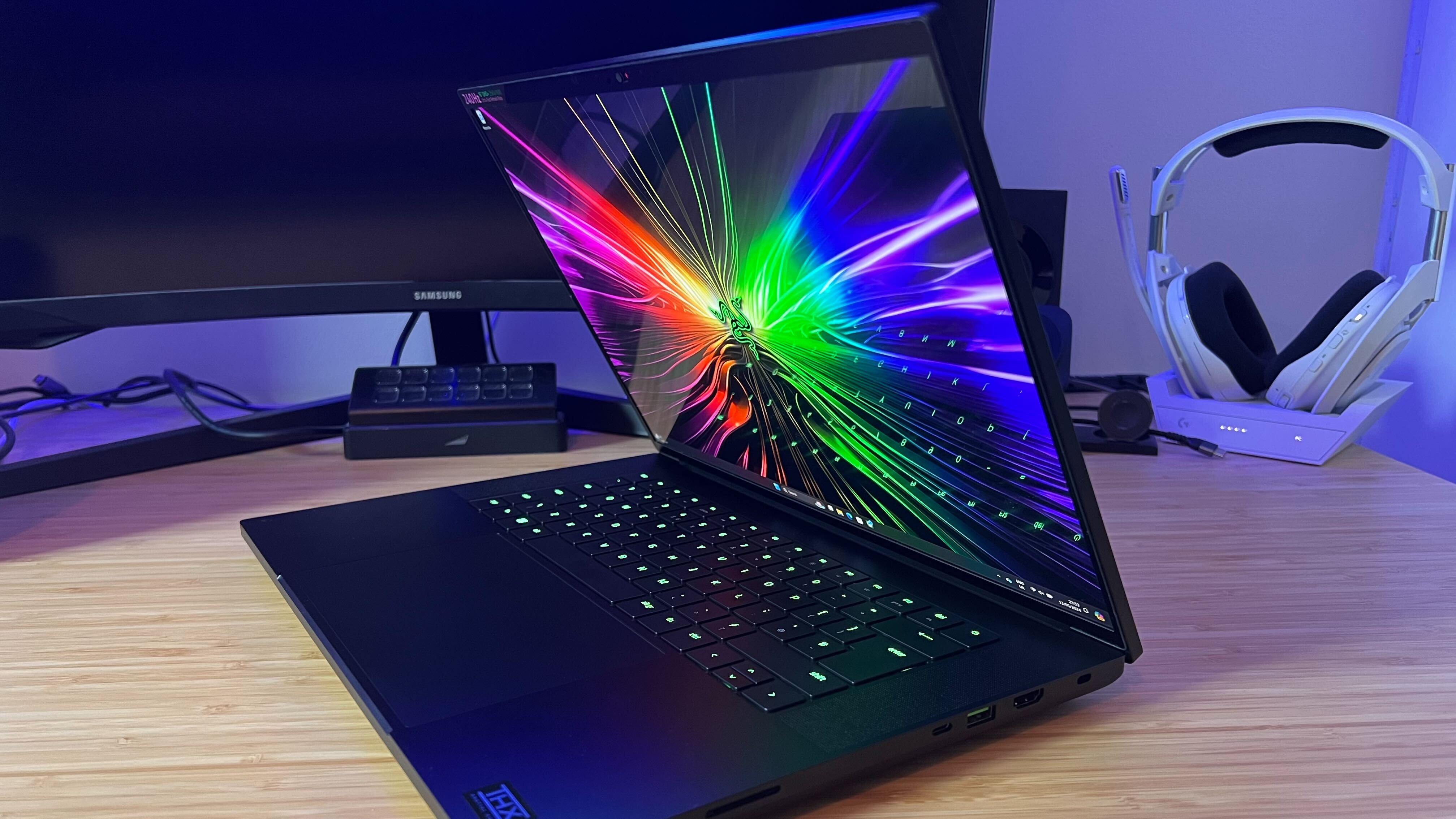 Side view of Razer Blade 16 with lid open and display on