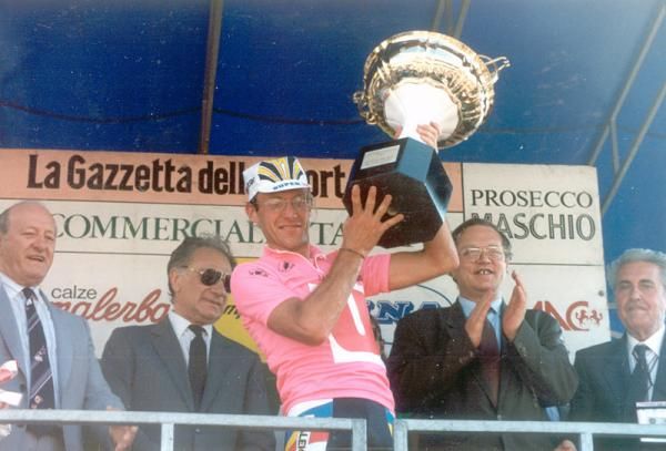 Laurent Fignon hoists his trophy aloft for winning the 1989 Giro d'Italia.