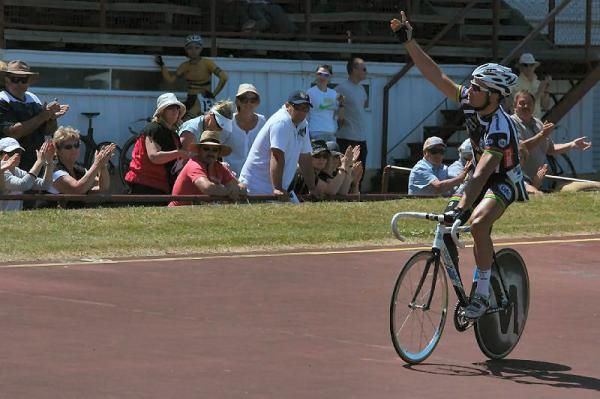 Jiri Jezik salutes the crowd after winning his heat of the Men's Wheel Race.