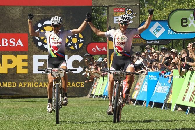 Christoph Sauser and Jaroslav Kulhavy of Burry Stander-Songo celebrate after winning stage 4 and regaining the lead