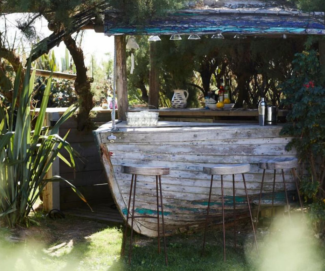 A bar made out of an old boat in the garden