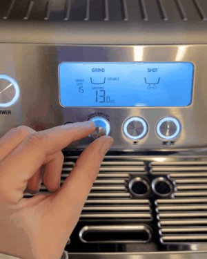 A GIF of a hand moving a dial on the Sage Barista Pro machine.
