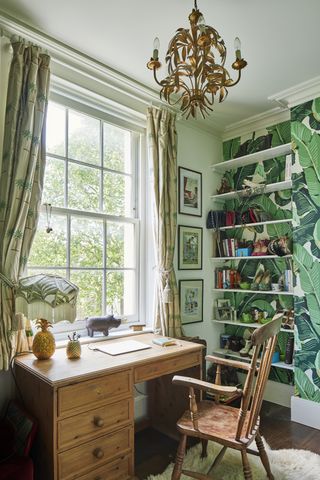 Home office with jungle wallpaper