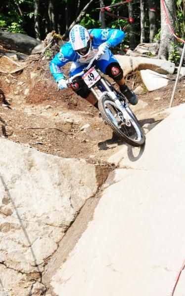 Kyle Straight goes over a big drop-off.