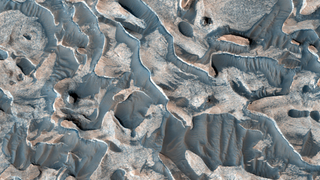 Wavy patterned deposits on Mars. 