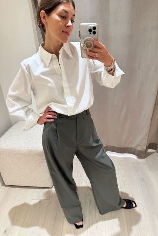 Woman in white shirt and pants.