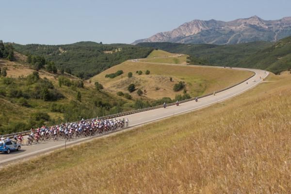 The main bunch chases the break up the first climb of the day.