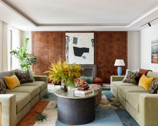 Living room with wood panelling by Studio Ashby