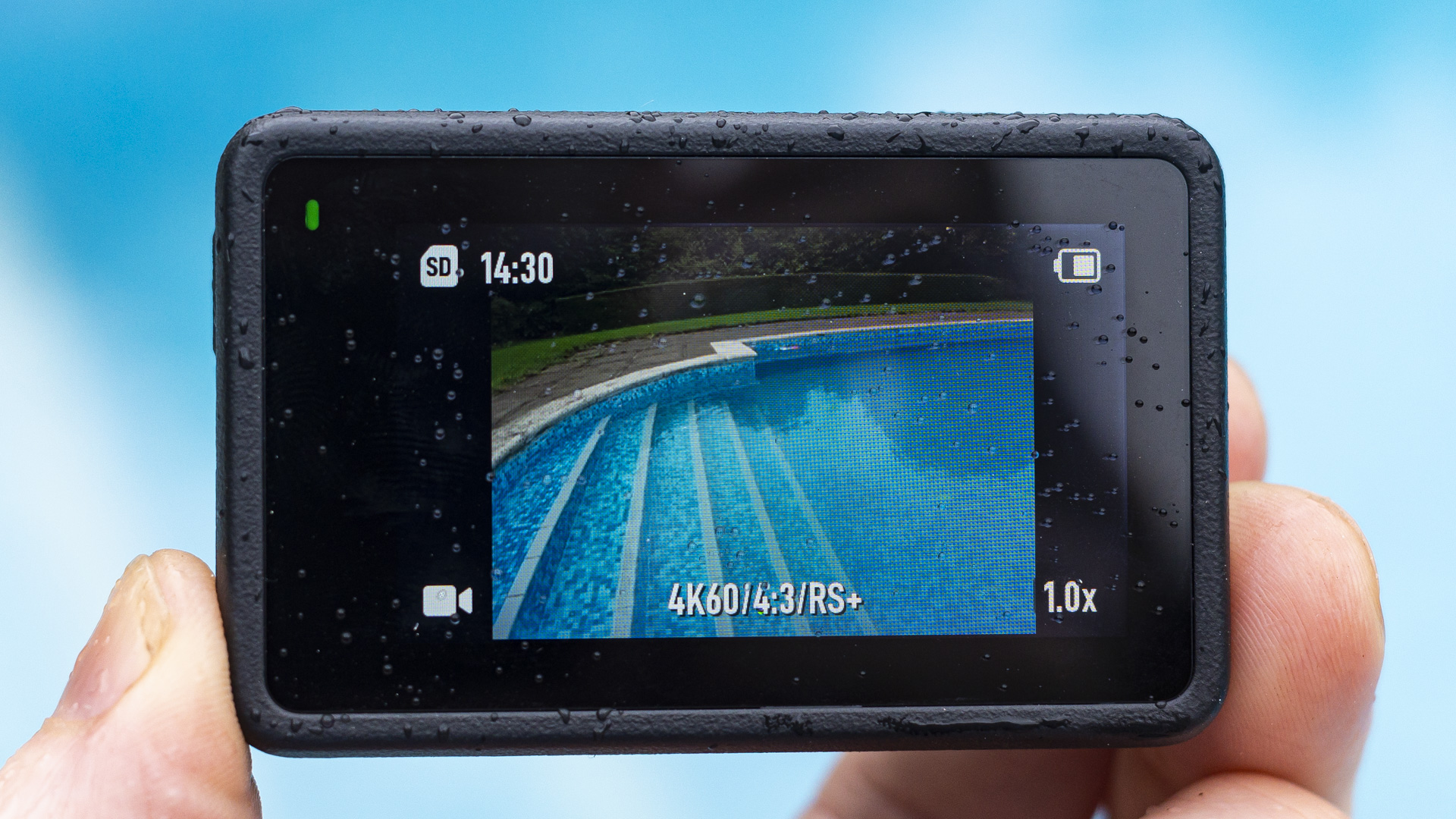 DJI Osmo Action 4 camera rear screen with liveview of swimming pool