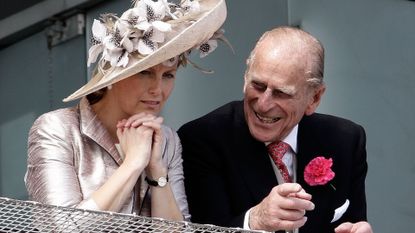 Prince Philip, Duke of Edinburgh and Sophie Rhys-Jones, Countess of Wessex wait for the start of the Epsom Derby at Epsom Downs racecourse on June 4, 2011 in Epsom, England. Carlton Hall had been the Bookmakers favourite to win the Derby, but came in third place, with Pour Moi winning.