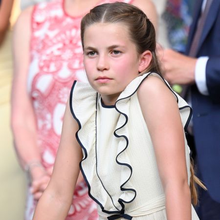 Princess Charlotte wearing an ivory ruffled dress 