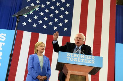 Clinton and Sanders together at a rally