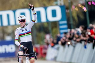 Dutch Fem Van Empel celebrates as she crosses the finish line to win the elite women's race of the World Cup cyclocross cycling event in Antwerp on Saturday 23 December 2023, stage 9 (out of 14) of the UCI World Cup competition. BELGA PHOTO JASPER JACOBS (Photo by JASPER JACOBS / BELGA MAG / Belga via AFP)