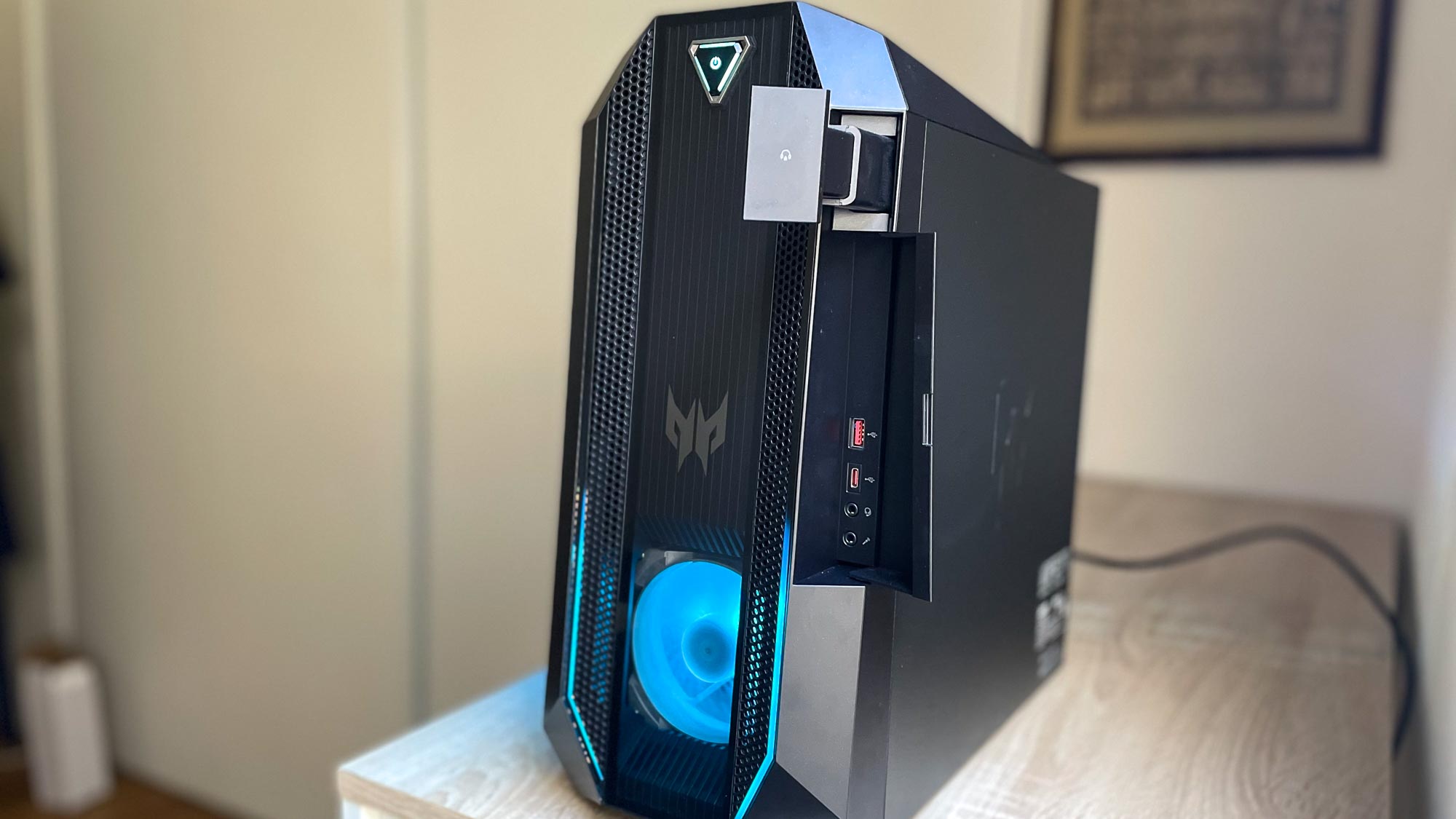 Acer Predator Orion 3000 viewed front on, with front panel open showing ports