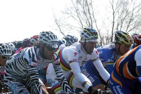 2003 and world champion Mario Cipollini rides with Johan Museeuw