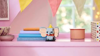 Lego Dumbo on a pink shelf