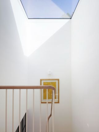 Staircase skylight at Danish mews house