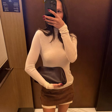 fashion influencers carrying The Row Peggy Clutch