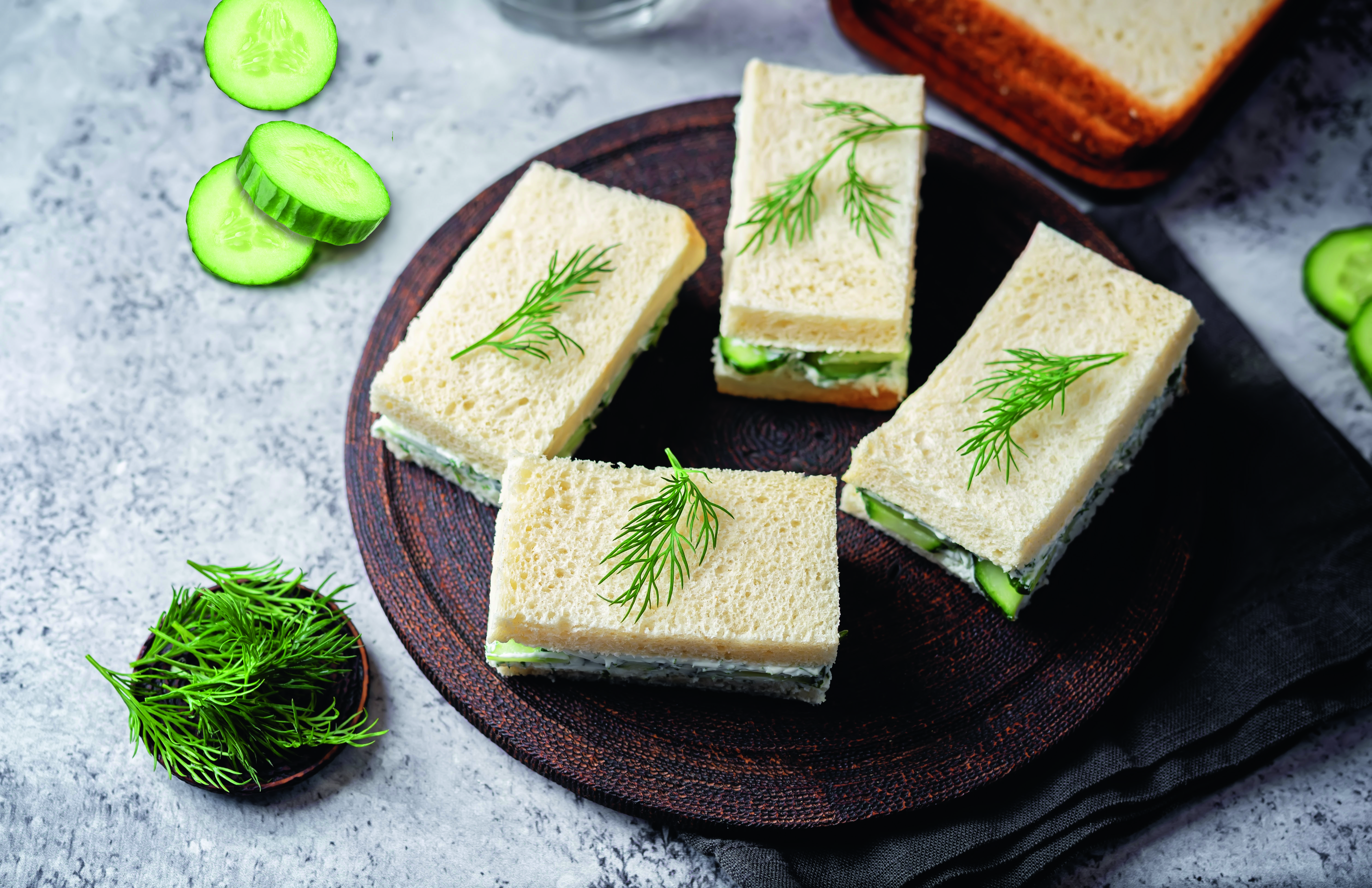 A plate of cucumber sandwiches