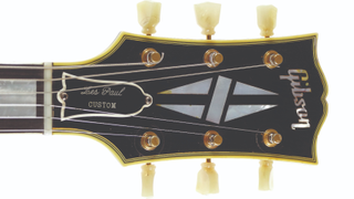 Headstock of a Gibson “Black Beauty” Les Paul Custom electric guitar