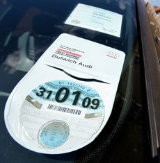 A 2008/ 2009 car tax disc is on display in a car windscreen on August 4, 2008 in London, England. Some MPs believe plans for new increased car tax rates on high fuel consumption vehicles shou