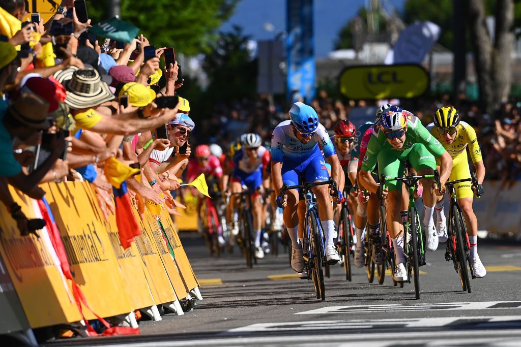 LAUSANNE SWITZERLAND JULY 09 LR Michael Matthews of Australia and Team BikeExchange Jayco Wout Van Aert of Belgium and Team Jumbo Visma Green Points Jersey and Tadej Pogacar of Slovenia and UAE Team Emirates Yellow Leader Jersey sprint at finish line during the 109th Tour de France 2022 Stage 8 a 1863km stage from Dole to Lausanne Cte du Stade olympique 602m TDF2022 WorldTour on July 09 2022 in Lausanne Switzerland Photo by Tim de WaeleGetty Images