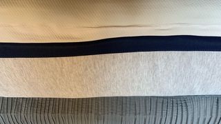 Close up of imperfect edging on the Helix Midnight mattress
