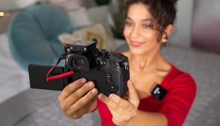 Woman vlogging with one of the best wireless microphones