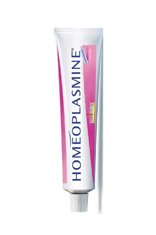 A tube of Homeoplasmine set against a white background.