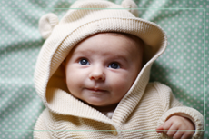baby wearing hooded top