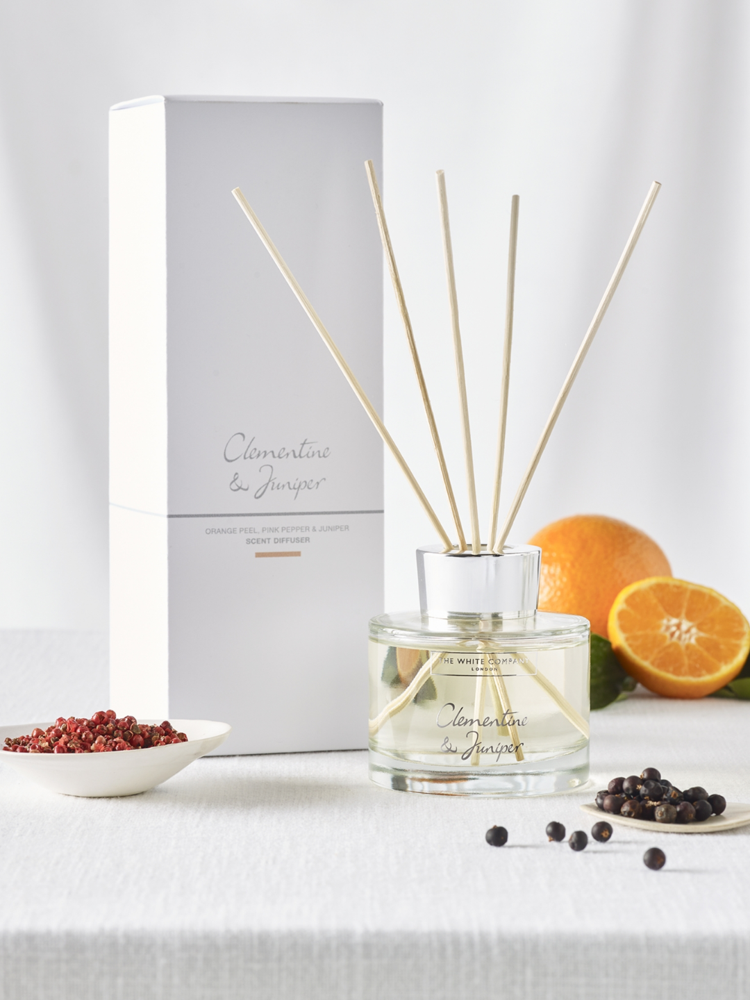 A clementine and juniper diffuser from The White Company