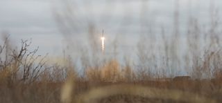 A Russian Soyuz MS-02 rocket lifts off from Baikonur Cosmodrome, Kazakhstan on Oct. 19, 2016 to begin a two-day journey to the International Space Station for its U.S.-Russian crew.